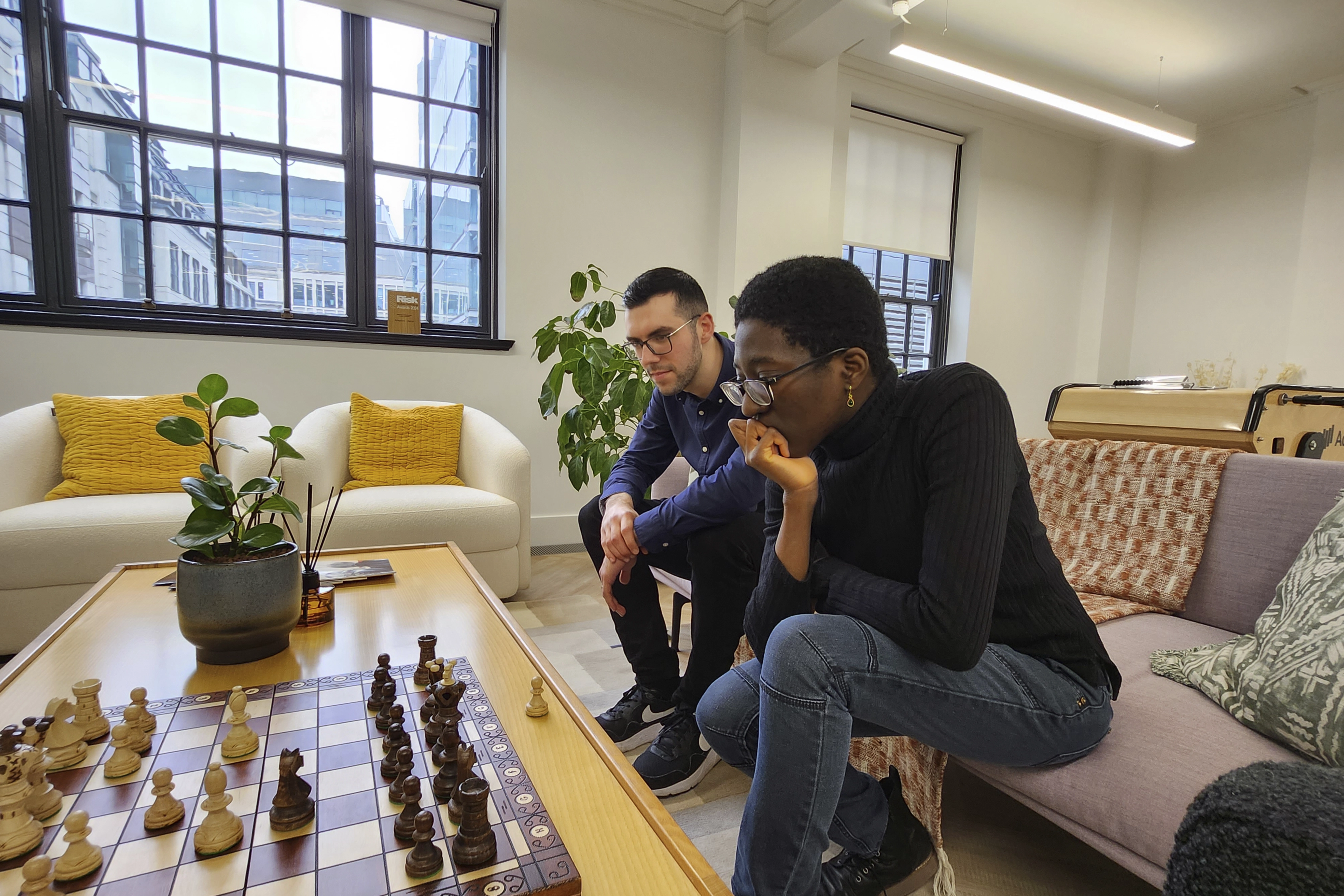 Employees playing chess at Adaptive