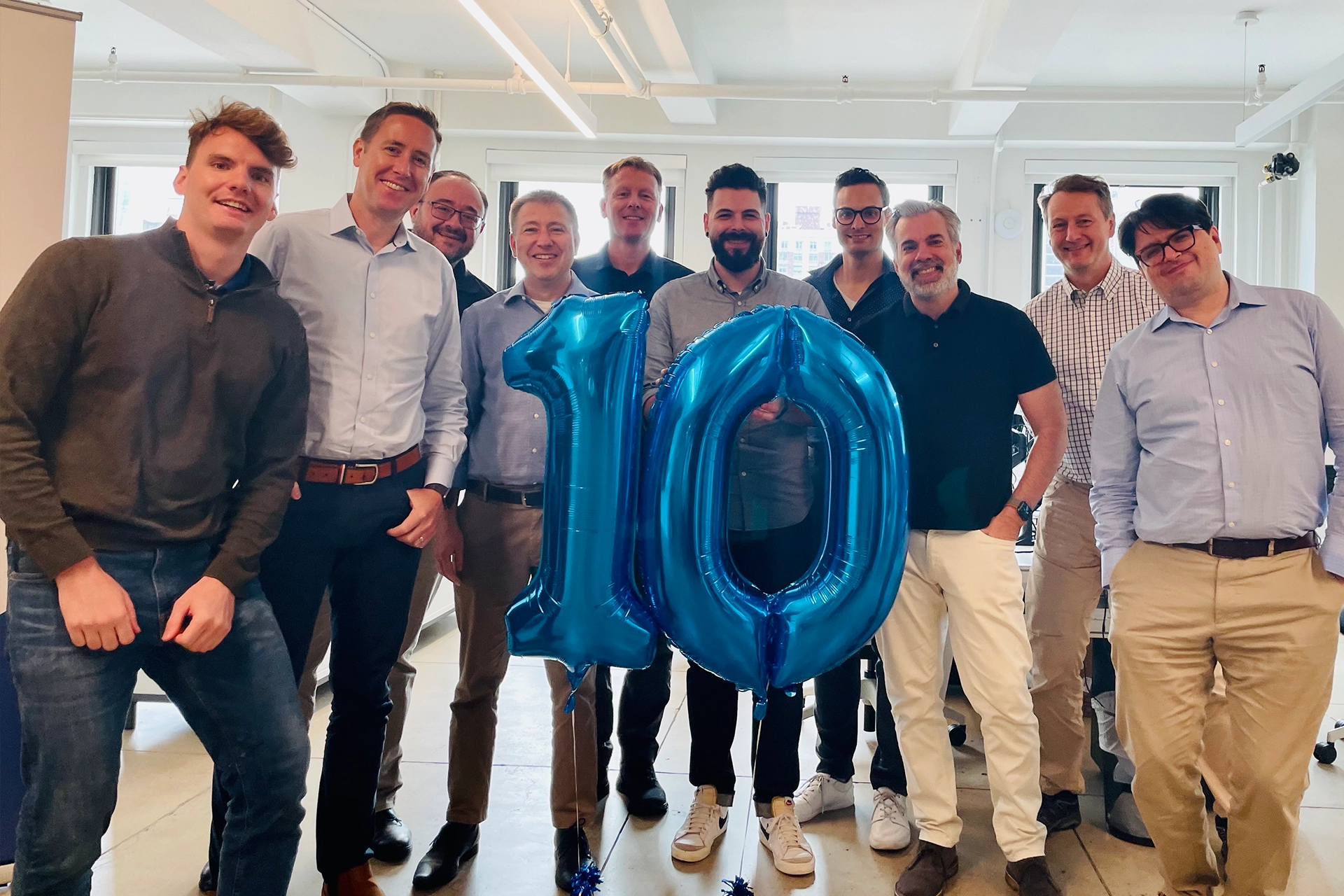 Group of people celebrating Adaptive's 10th Anniversary